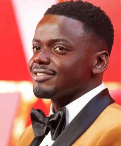 Classy English Actor Daniel Kaluuya Smiling By Diamond With Number